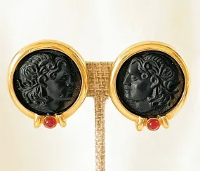 Classic round black intaglio style coin earrings with gold tome metal trim and cabachon style red stones at the base